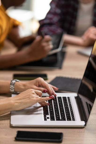 istock Typing work emails on laptop at the office 1314481898