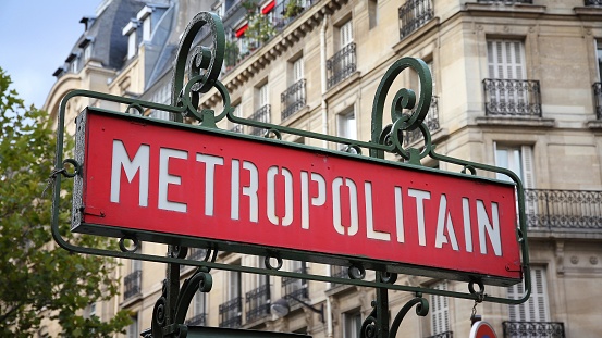 Paris, France - retro metro station sign. Subway train entrance.