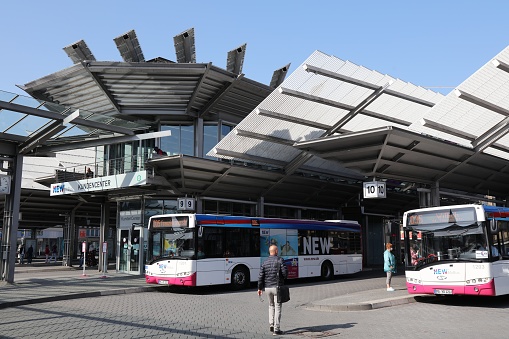 People wait at the bus station of Gladbach in Moenchengladbach, a major city in North Rhine-Westphalia region of Germany.