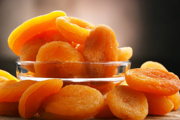 istock Composition with a bowl of dried apricots. Delicacies 1314485505