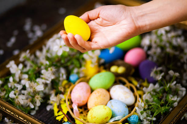 istock Painting easter egg on old wooden table 1314488670