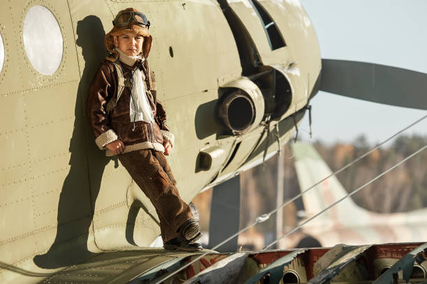 istock Young Aviator on the wing of a large aircraft 1314490016