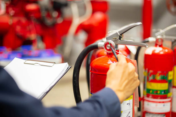 istock Engineer are checking and inspection a fire extinguishers tank in the fire control room for safety training and fire prevention. 1314491765