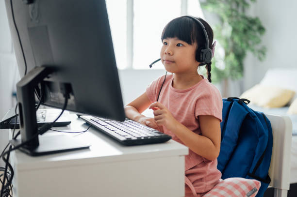 istock Young Asian cute girl studying with computer at home during pandemic 1314491931