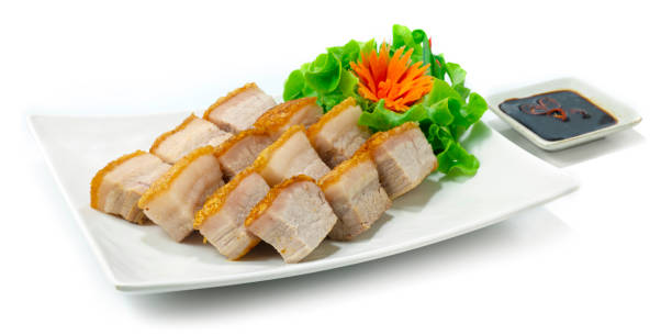 Crispy Belly Pork Hong Kong Style Brown Skin so Crispy served Black Soy Sauce stock photo