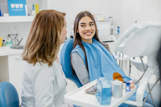 istock Young woman at the dentist 1314494676