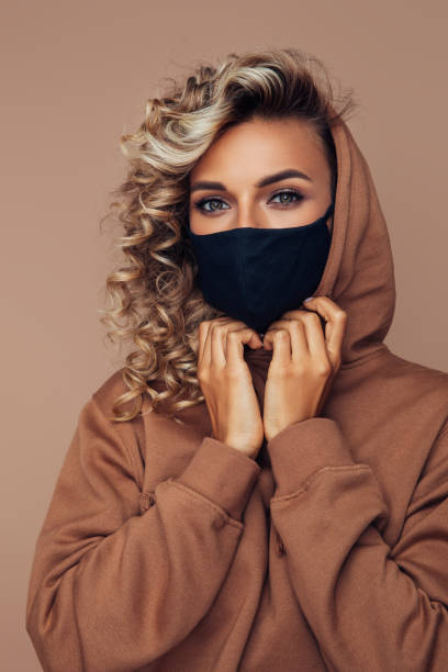 istock Girl in black protective mask 1314496527