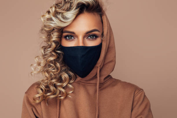 Girl in black protective mask