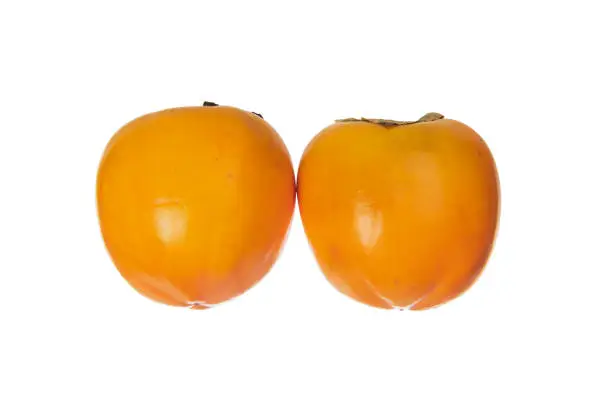 A pair of persimmons isolated on white background