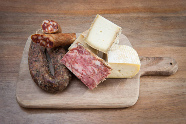 istock cold cuts  and cheeses typical of the Rome area isolate don wooden background 1314499700