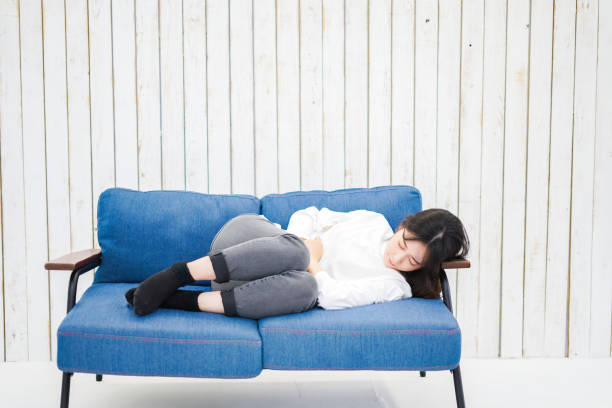 istock Young woman taking a nap in her room 1314500588