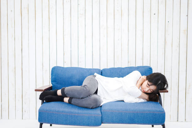 istock Young woman taking a nap in her room 1314500593