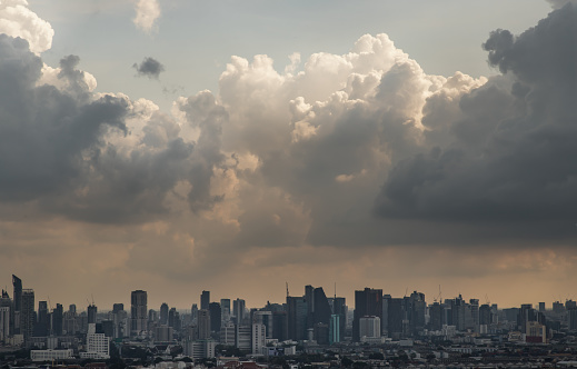 Beautiful sky and cloud view of Bangkok with skyscrapers in the business district in the afternoon. Selective focus.