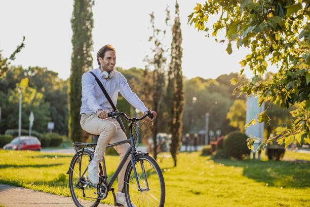 istock Young businessman uses a bicycle as a mode of transportation to work 1314502102
