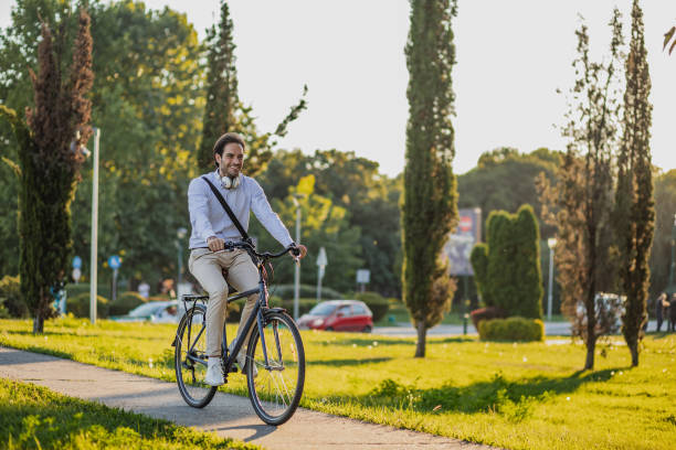 istock Young businessman uses a bicycle as a mode of transportation to work 1314502214