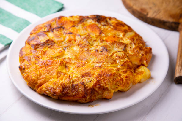 istock Spanish omelette with cheese, potatoes and sweet potato 1314502388