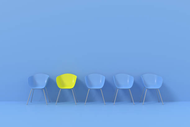 istock Yellow chair on blue with different concepts. 3D background design. 3D rendering. 1314502909