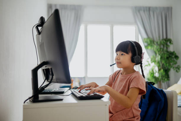 istock Young girl wearing headphone for online study during homeschooling 1314504214