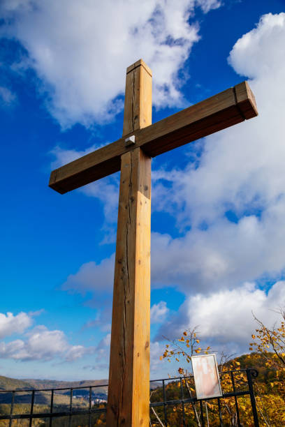 istock Cross on the mountain under medieval monastery, Saint John under the Cliff (Svaty Jan pod Skalou), Central Bohemia, Czech Republic, October 24, 2020 1314504778