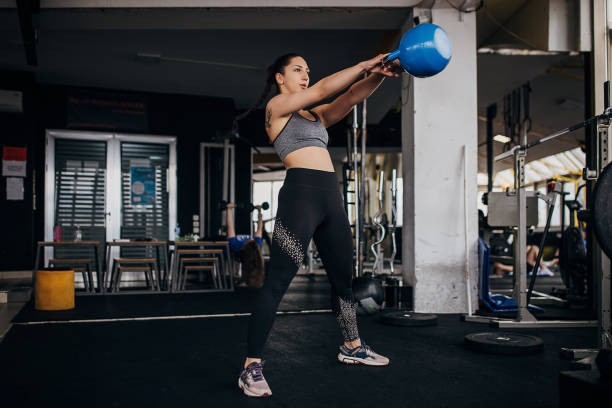 istock Woman exercising with kettlebell 1314505111