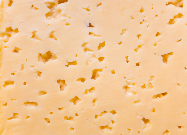 istock Yellow cheese texture for appetite food background image. 1314506692