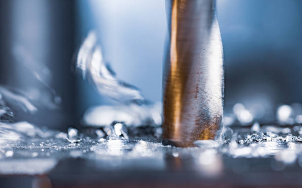 istock Drilling process with shavings close-up at the workplace in workshop 1314509792