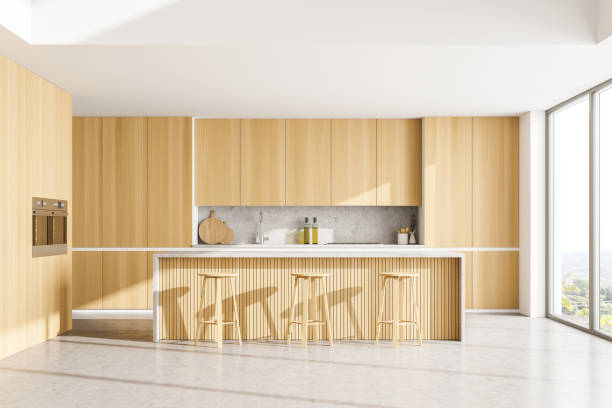 istock Wooden kitchen set with table and chairs near window 1314510719