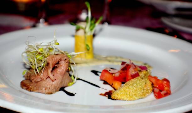 istock Tastefully arranged appetizers in a white round plate 1314511445