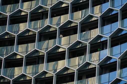 Singapore, 25 July 2020, Close view of the honeycombed-pattern windows of the DUO building, a new highrise building near the Bugis station.