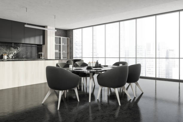 istock Dark kitchen interior with eating table and kitchen set near window 1314511590