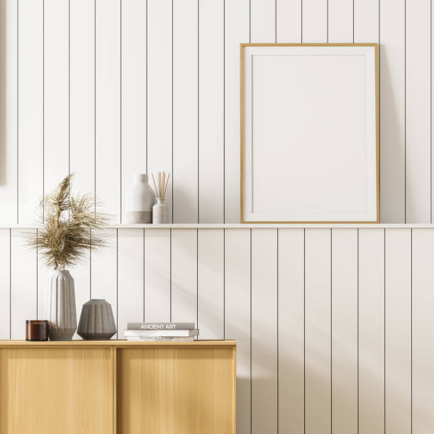 istock Bright interior with white wall and wooden sideboard 1314512605