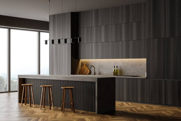 istock Wooden dining room, bar chairs and table near window 1314514416