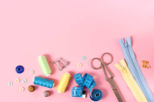 istock sewing accessories close-up. hobbies, fabrics and threads for sewing 1314514790