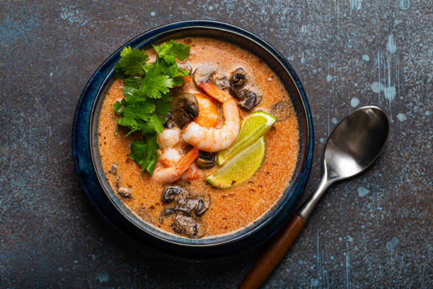 istock Thai soup Tom Yum with seafood in bowl from above 1314516515