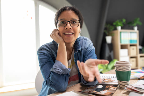 istock Explaining the way she shoots photographs during a video conference 1314518207