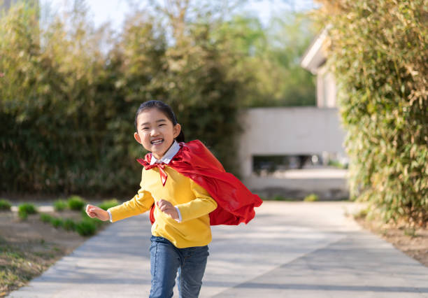 istock Supergirl Running 1314520336