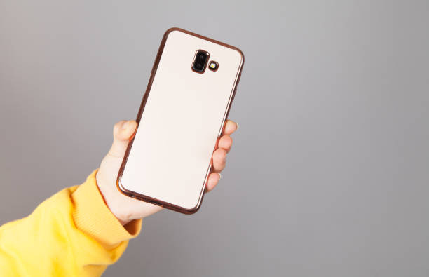 istock In a woman's hand a smartphone and beautiful case. 1314520882