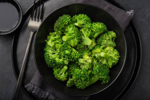 istock steamed broccoli in black bowl 1314522774