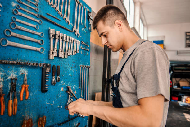istock Mechanic at work in his garage 1314523948