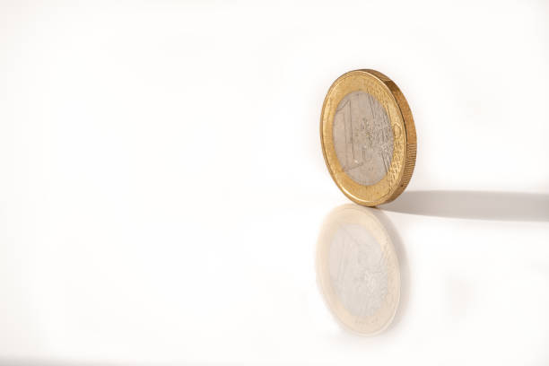 istock One euro coin on a white plate 1314530671