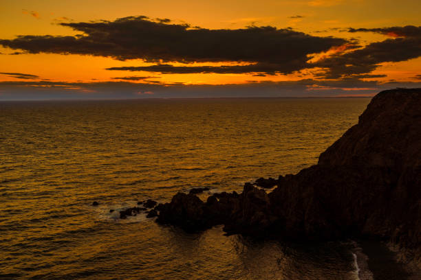 pomarańczowy blask zachodu słońca na zatoce fundy - grand manan island zdjęcia i obrazy z banku zdjęć