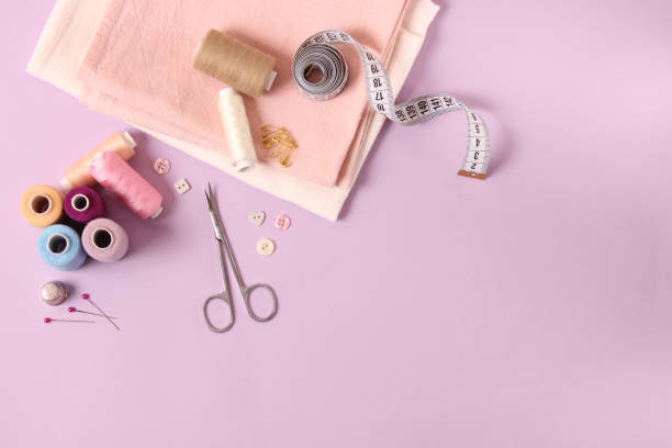 istock sewing accessories close-up. hobbies, fabrics and threads for sewing 1314537355