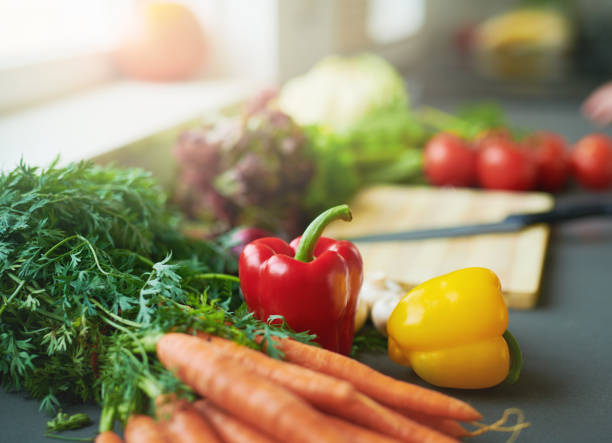 istock Shot of fresh vegetables on a table in a kitchen at home 1314537428
