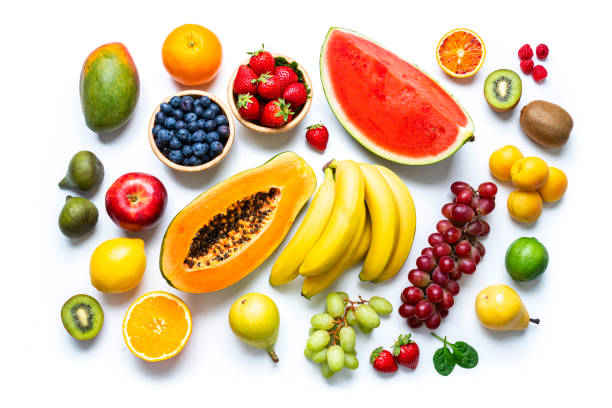 Multicolored fresh fruits on white background