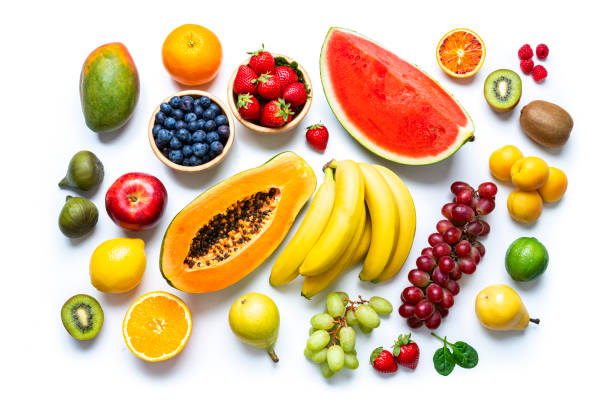 frutas frescas multicoloridas em fundo branco - healthy eating multi colored orange above - fotografias e filmes do acervo