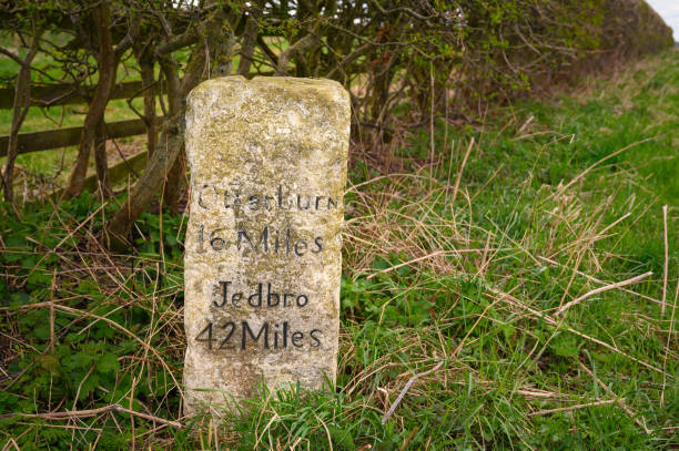 An old traditional milestone marking the distance from Amesbury to London, England, United Kingdom.