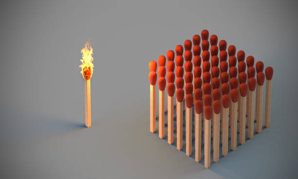lighted match and group of undamaged matches.