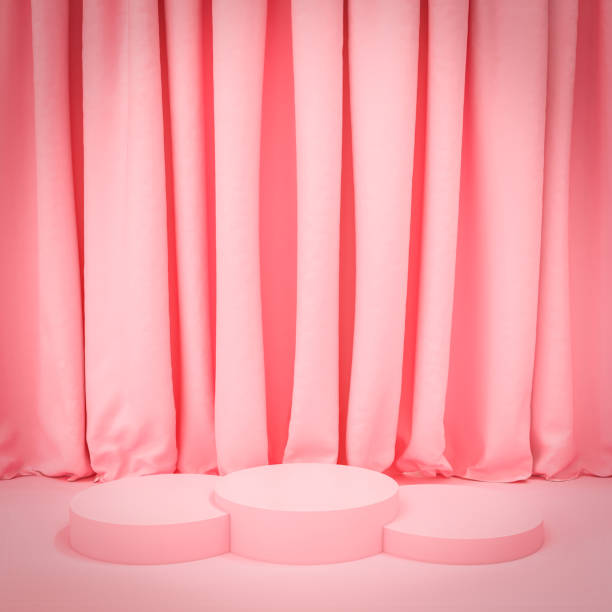 istock pink curtains and circular podium. 1314540486