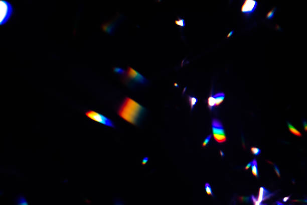 istock colorful warm rainbow crystal light leaks on black background 1314540673