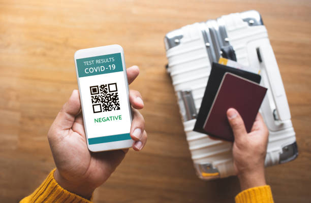 Test results with covid-19 for traveler.protection or security in pandemic situation. Test results with covid-19 for traveler.protection or security in pandemic situation.global cooperation. priority baggage tag stock pictures, royalty-free photos & images